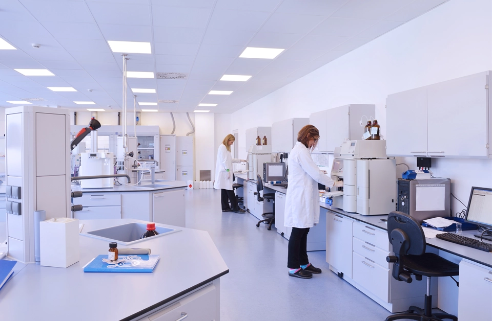 Two people working in a lab.