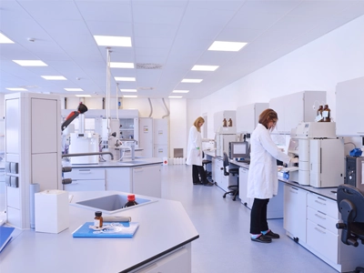 Two people working in a lab.